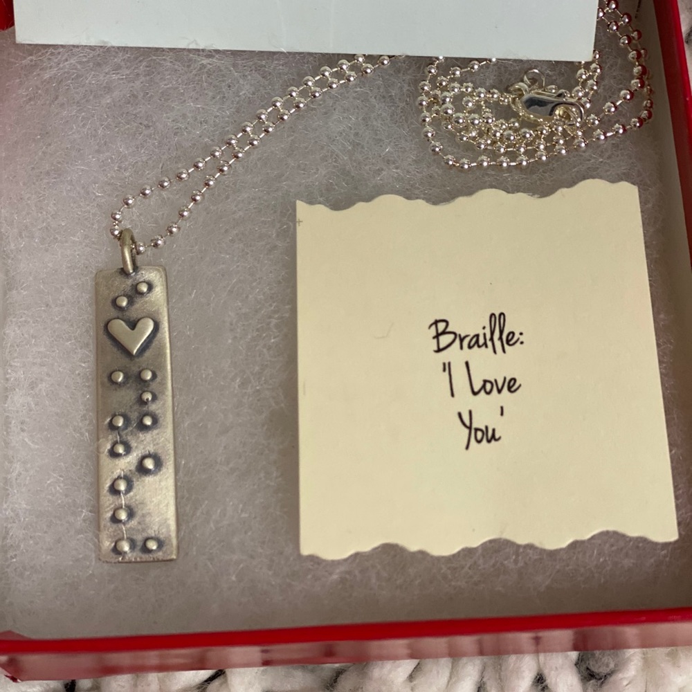 LKathy Bransfield Braille “I love you” necklace